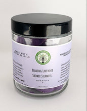 Load image into Gallery viewer, Close up of Relaxing Lavender Shower Steamers in jar with black lid