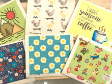 Load image into Gallery viewer, An eco-friendly Swedish dishcloth made from a blend of cotton and cellulose, with a textured surface for easy cleaning and scrubbing. The cloth is thin yet durable, and can be easily wrung out to remove excess water. It is shown in a variety of colors and patterns, with a label that reads 'Swedish Dishcloth