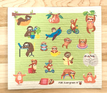 Load image into Gallery viewer, An eco-friendly Swedish dishcloth made from a blend of cotton and cellulose, with a textured surface for easy cleaning and scrubbing. The cloth is thin yet durable, and can be easily wrung out to remove excess water. It is shown in a variety of colors and patterns, with a label that reads 'Swedish Dishcloth