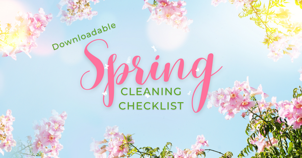 sky blue background, pink and yellow flowers around the edges, the middle reads Downloadable Spring Cleaning Checklist