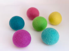 Load image into Gallery viewer, bright wool color laundry dryer balls helps remove static and dry clothes in half the time saving you money. Helps with pet hair and help keep wrinkles down. 