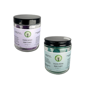 clear jar with black lid , bluish label reads PUR Evergreen Eucalyptus Menthol Shower Steamers and one with purple label that reads lavender shower steamers