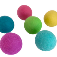 six wool dryer balls in bright colors