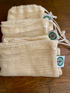 Natural organic cotton produce bags 10x12  pack of three natural for your home PÜR Evergreen 3 pack of organic cotton produce bags PÜR Evergreen for fruit and veggies 10x12 medium size natural products for your home Produce bag earth shopping Sustainable Ecofriendly Green natural home goods PÜR Evergreen zero waste Mrs Meyers Method Forces of Nature strong lightweight stretchy flexible handbag friendly reusable washable Cotton biodegradable