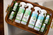 Load image into Gallery viewer, 4 empty 16oz spray bottles and 4 bottles of 2oz cleaner Sustainable Ecofriendly Green natural home goods PÜR Evergreen antibacterial all-purpose cleaner non-toxic families safe natural zero waste Mrs Meyers Method Forces of Nature sassy spearmint cozy bliss eucalyptus mint yummy smell good scent fresh
