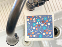 Load image into Gallery viewer, An eco-friendly Swedish dishcloth made from a blend of cotton and cellulose, with a textured surface for easy cleaning and scrubbing. The cloth is thin yet durable, and can be easily wrung out to remove excess water. It is shown in a variety of colors and patterns, with a label that reads &#39;Swedish Dishcloth